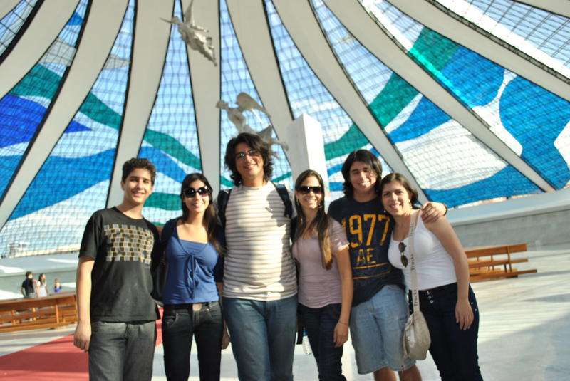 Kris poses with Brasileiros inside architect Oscar Niemeyers Cathedral of Brasilia